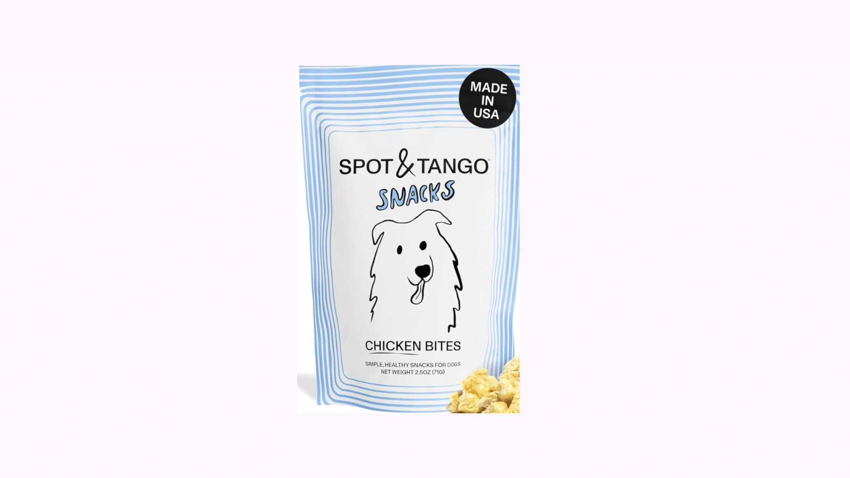 Spot & Tango UnKibble dog food and treat packages displayed on wooden floor with measuring scoop included