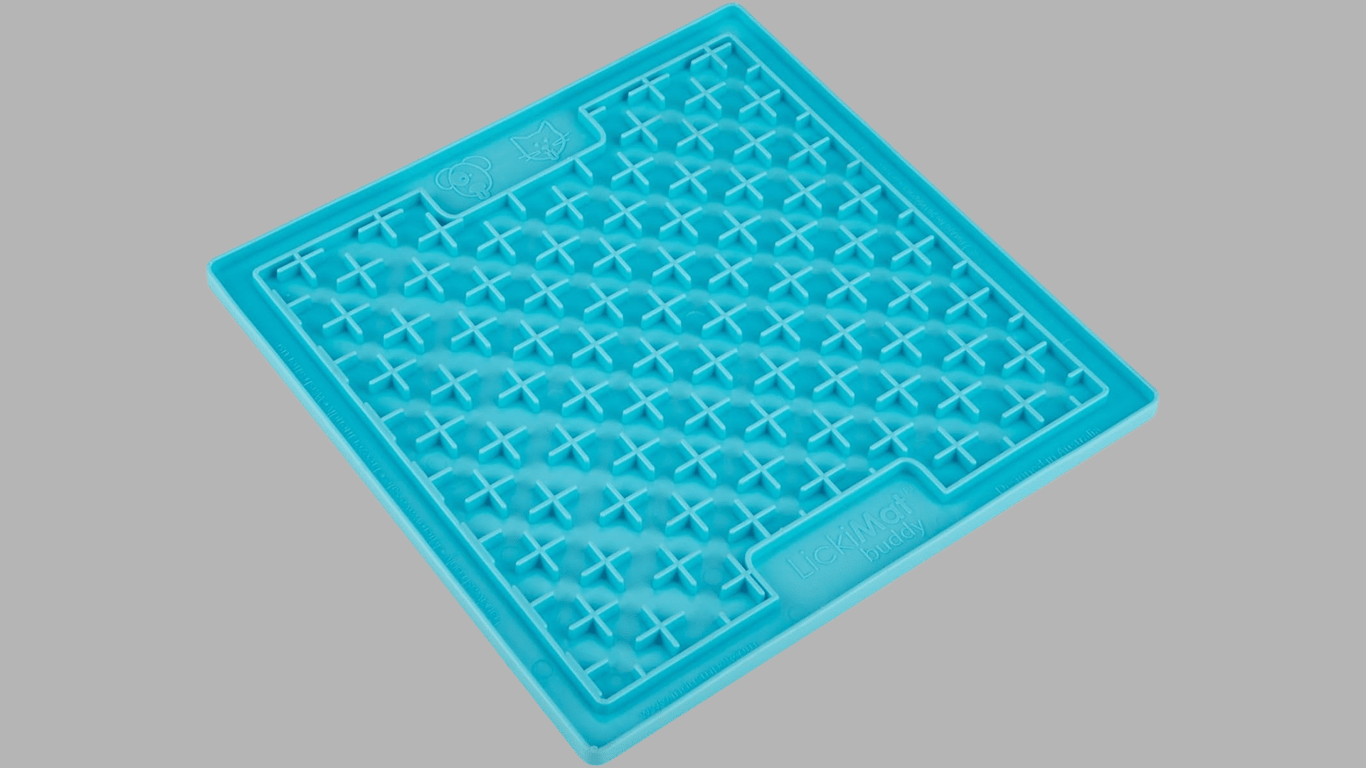 blue silicone lick mat with raised cross pattern texture designed to spread treats and encourage slow feeding for pets