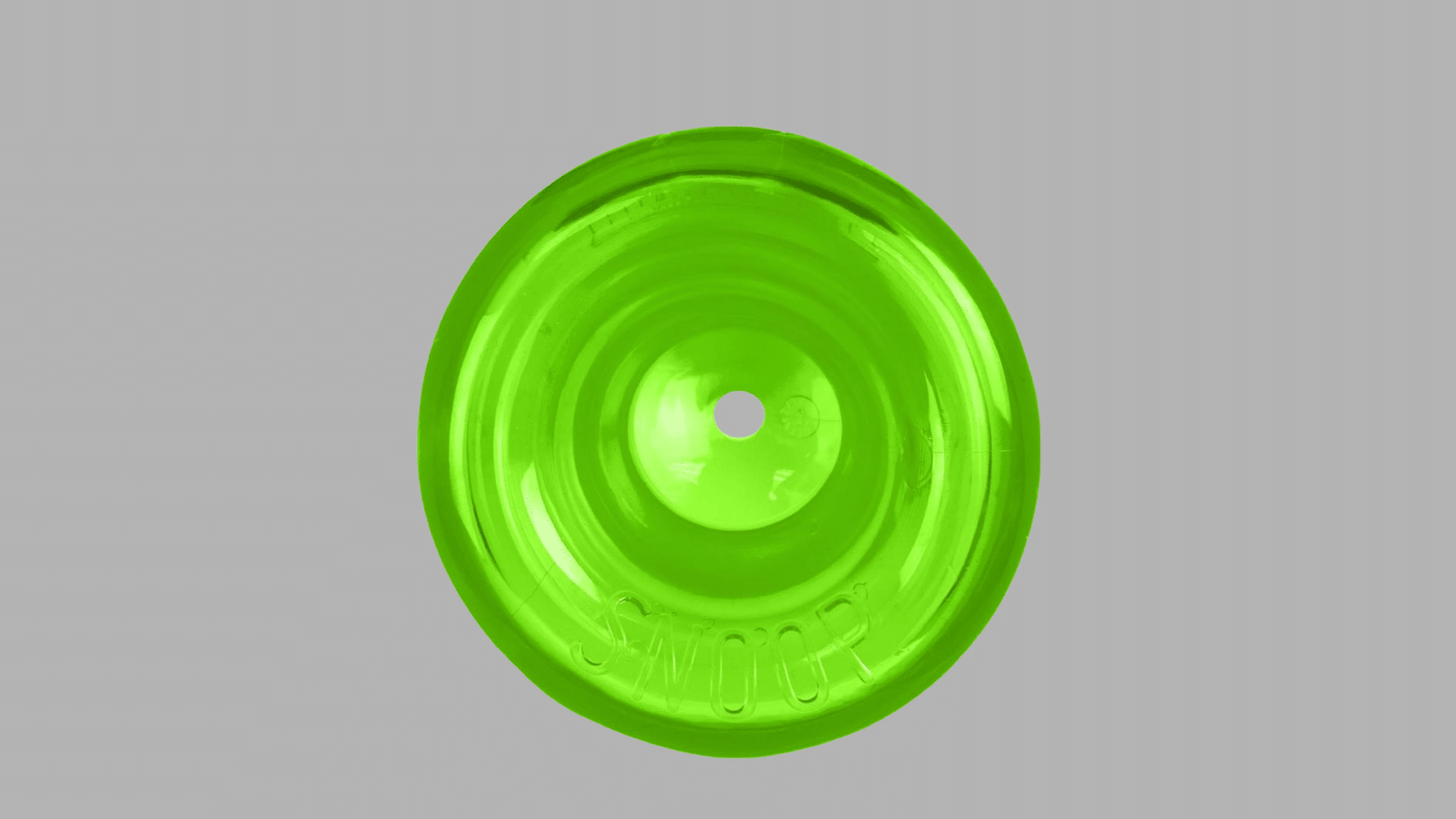bright green dog flying disc toy with circular ridged design and small center hole displayed on a plain background